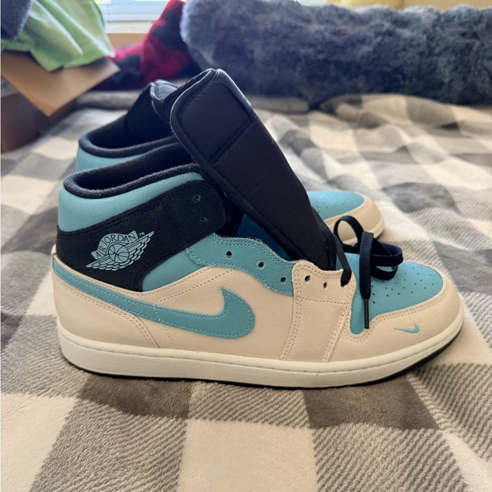 Jordan Athletic Shoes in Black, Blue, and Cream